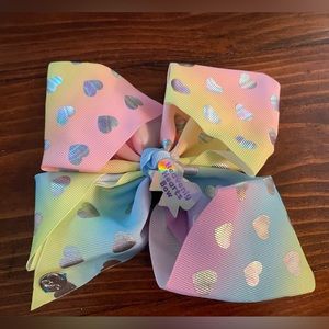 Jojo Siwa signature collection Heavenly Hearts Bow hair clip.